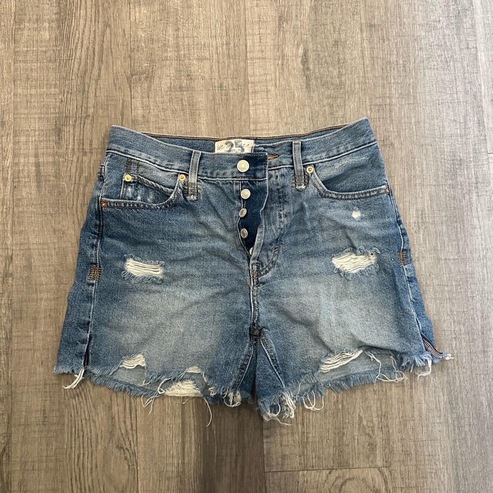 Free people mid rise long denim shorts